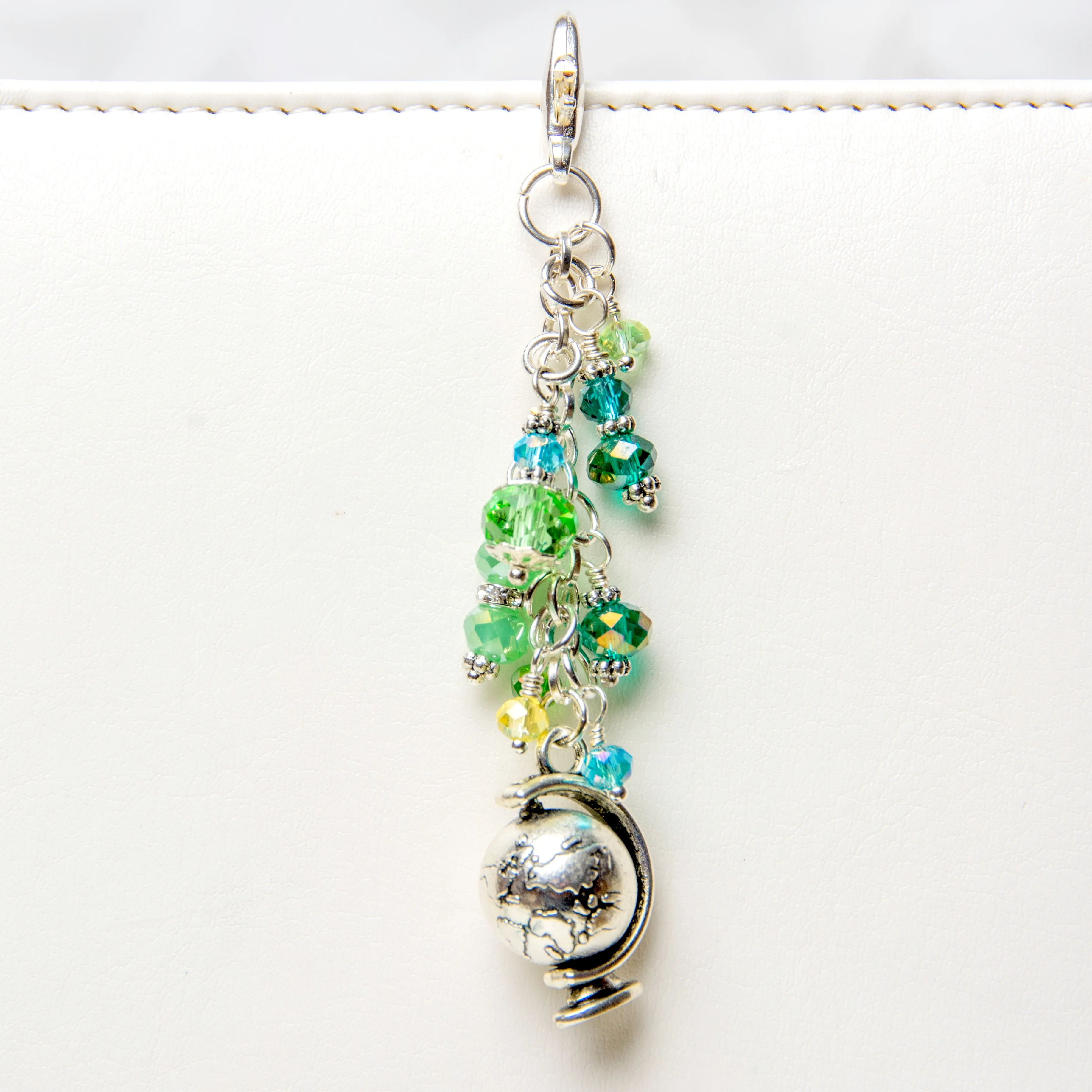 Globe Planner Charm with Blue and Green Crystal Dangle