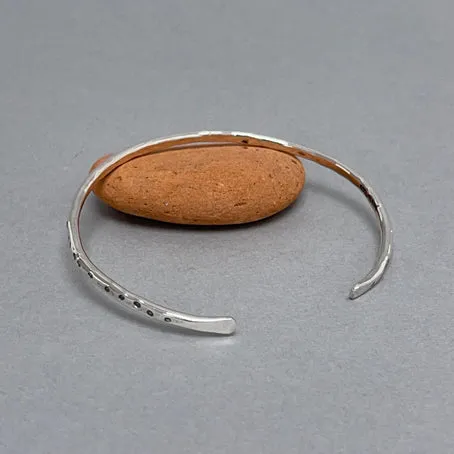 Open silver bangle - oval dots